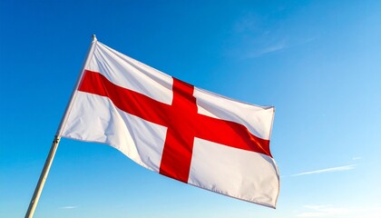 England’s national flag with red Cross of Saint George on white field flying against clear blue sky—bold, minimal design evokes national identity, heritage, and historical symbolism.