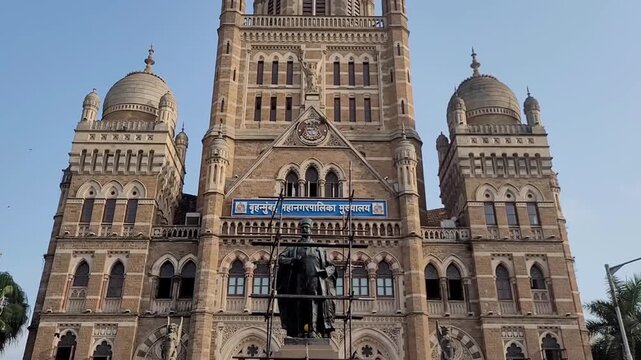 The iconic BMC (Brihanmumbai Municipal Corporation) building at Chhatrapati Shivaji Maharaj Terminus, Mumbai, with the statue of Sir Pherozeshah Mehta in front
