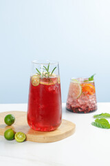 Refreshing Grape Cocktails with Herbs and Lime on Wooden Board - Summer Drinks