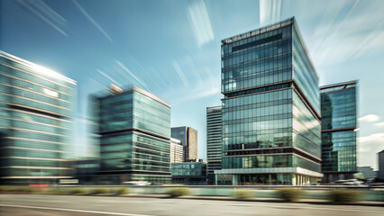 Modern glass office buildig under sunny sky, with viw of surrounding city centr business buildings.