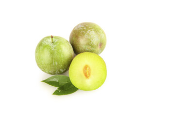 Fresh Green Plums with Half Cut Fruit Showing Yellow Flesh and Pit on White Background
