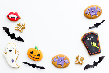 Funny Halloween gingerbread biscuits, homemade cookies, top view