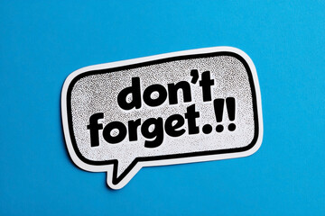 Reminder note on bright blue background displaying the 'don't forget' message