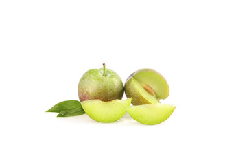 Fresh Green Plums Whole and Sliced with Leaves on White Background