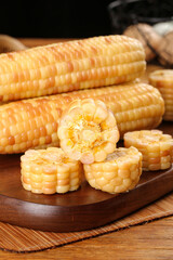 Fresh Sweet Corn Cobs and Slices on Wooden Cutting Board - Healthy Organic Vegetable Food Ingredient