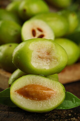 Fresh Green Olives Halved Showing Pits - Sweet Mediterranean Fruit from Deep Rooted Old Growth Trees