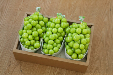 Fresh Green Seedless Grapes in Paper Bags Wooden Box Organic Fruit Packaging