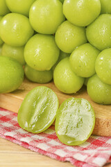 Fresh Green Grapes with Water Drops on Wooden Board - Healthy Fruit Selection