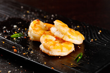 Grilled Shrimp with Spices on Black Slate - Fresh Seafood Cuisine