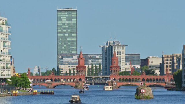 Oberbaumbrucke crossing the River Spree in Berlin on a clear sunny day - Germany