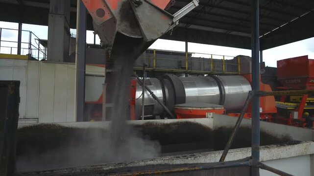 Workers Operating Machinery Applying Asphalt on Road Construction