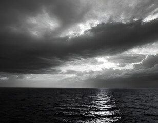 Amazing sunset on the sea of black and white clouds. A storm clouds over the sea.