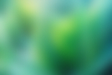 Abstract textured background with a soft focus and a gradient of green and blue hues, evoking a sense of nature and tranquility