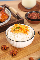 Gourmet Spicy Shredded Chicken Rice Bowl with Asian Condiments and Star Anise