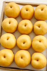 Fresh Golden Asian Pears in Wooden Gift Box Ready for Market Display