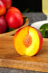Fresh Red and Yellow Nectarine Half on Wooden Board - Shaanxi Dalian Stone Fruit
