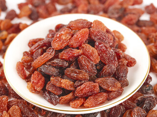 Red Dried Raisins in White Bowl with Shallow Focus Food Photography