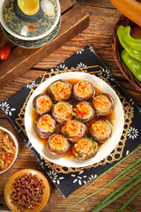 Steamed Stuffed Mushrooms with Garlic Vermicelli in Sauce - Traditional Chinese Teppanyaki Style Dish