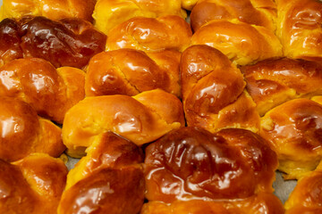 Homemade Mucenici, traditional desserts made in the figure 8, smeared with honey and chopped nuts