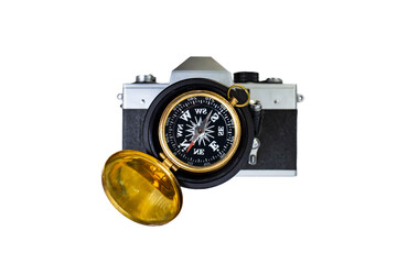 Golden compass on a vintage defocused analog film camera, photography guidance concept isolated on white background