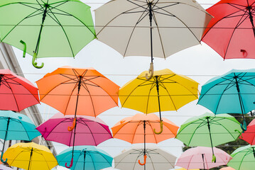 colorful umbrellas background. Colored umbrellas. Sky of colored umbrellas. Decor of umbrellas.