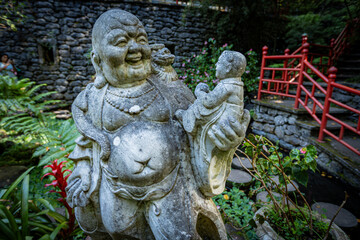 Buddha statue in the Monte palace garden in Funchal Madeira Portugal