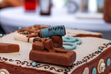 Creative chocolate cake decoration with fondant tools and icing