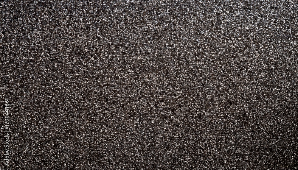 Poster dark metallic glitter texture with shimmering sparkles and fine grain surface creating elegant abstr