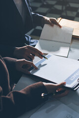 Lawyer explained to the client about the law that must be brought against the court case.