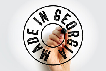 Obraz premium Made in Georgia text emblem badge, concept background