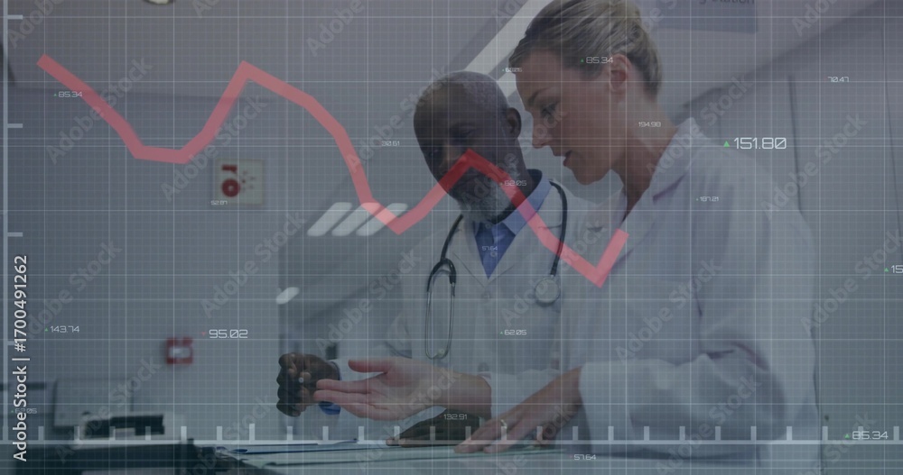 Poster reviewing data doctors using touchscreen table in hospital corridor, stethoscope and red line graph