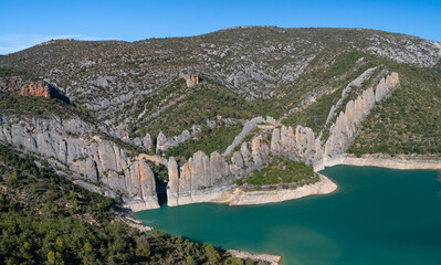 Aerial view of the "Finestres" (Finestras Wall) near the uninhabited village of Finestras in the Ribagorza region. Canelles Reservoir. Province of Huesca. Aragon. Spain. Europe