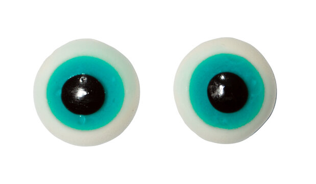 Two halloween gummy candy eyeballs with blue colors isolated on transparent background.