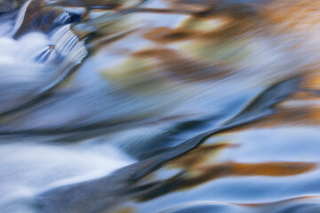 Abstract landscape at Bond Falls of a rapids on the Ontonogan River captured with motion blur, Ottawa National Forest, Michigan's Upper Peninsula, USA