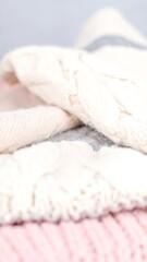 Soft, layered knit fabrics in pastel shades