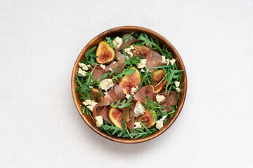 Delicious Salad with Figs, Pastrami, and Blue Cheese, Healthy Gourmet Meal Concept