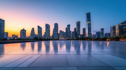 Obraz premium A breathtaking skyline at sunset, showcasing modern skyscrapers reflected on a tranquil surface, highlighting the beauty of urban architecture.