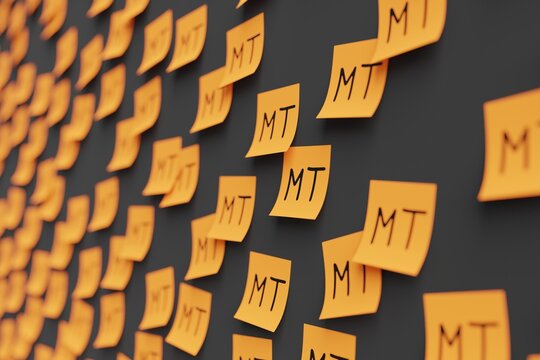 Many orange stickers on black board background with symbol of Mozambique metical drawn on them. Closeup view with narrow depth of field and selective focus. 3d render, illustration