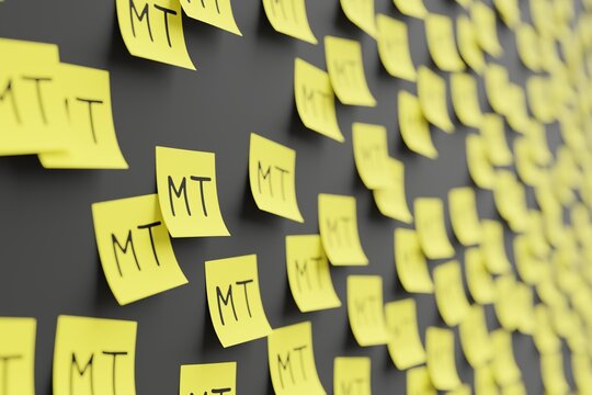 Many yellow stickers on black board background with symbol of Mozambique metical drawn on them. Closeup view with narrow depth of field and selective focus. 3d render, illustration