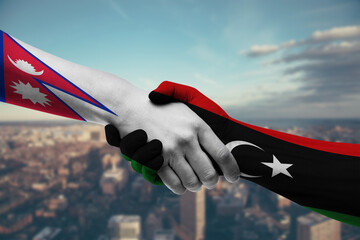 Shaking hands Nepal and_Libya
