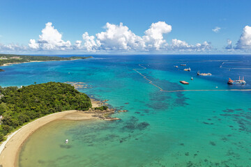 Aerial Editorial View of Oura Bay Coastline and Henoko Land Reclamation Area, Okinawa, Japan, Drone Photography