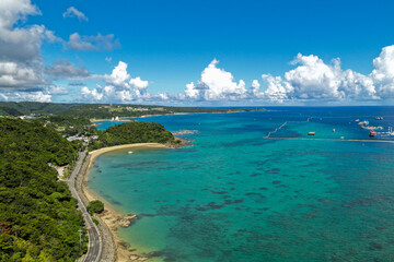 Fototapeta premium Aerial Editorial View of Oura Bay Coastline and Henoko Land Reclamation Area, Okinawa, Japan, Drone Photography