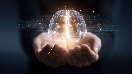 Human hands holding a glowing AI artificial intelligence brain. Concept human intelligence and artificial intelligence technology interaction. 