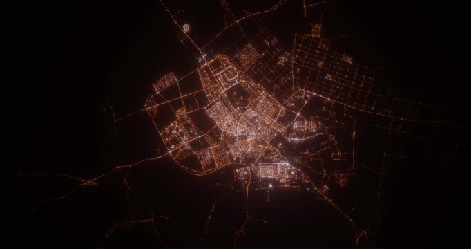 Tabuk (Saudi Arabia) aerial view at night. Satellite view on modern city with street lights. Camera is flying above the city, moving forward