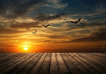 Obraz premium Bats fly across a vibrant sunset sky, framed by spiderwebs and viewed from a wooden deck.