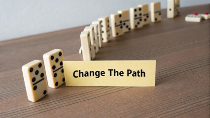 Change The Path Symbolized by Dominoes on a Wooden Surface