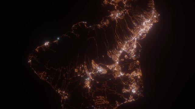 Oahu (Hawaii, USA) top view at night. Top view on modern city with street lights and glow effect. Camera is zooming in, rotating clockwise. Vertical video. The north is on the left side