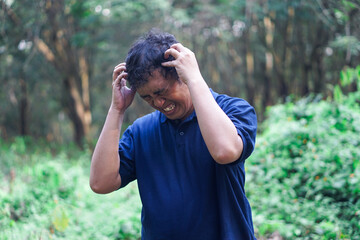 gesture, asian, man, male, isolated, portrait, people, happy, person, cheerful, guy, adult, casual, young, hand, background, positive, smile, indonesian, studio, handsome, showing, looking, standing, 