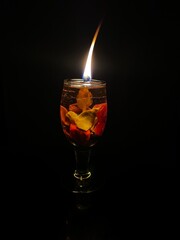 candle in glass