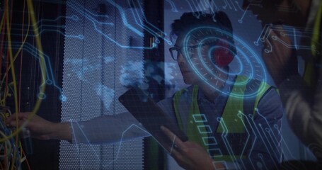 Two IT technicians inspecting Ethernet cables at server room rack, with device and hologram overlay